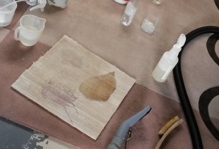 Stains being treated and removed from Tencel test pieces